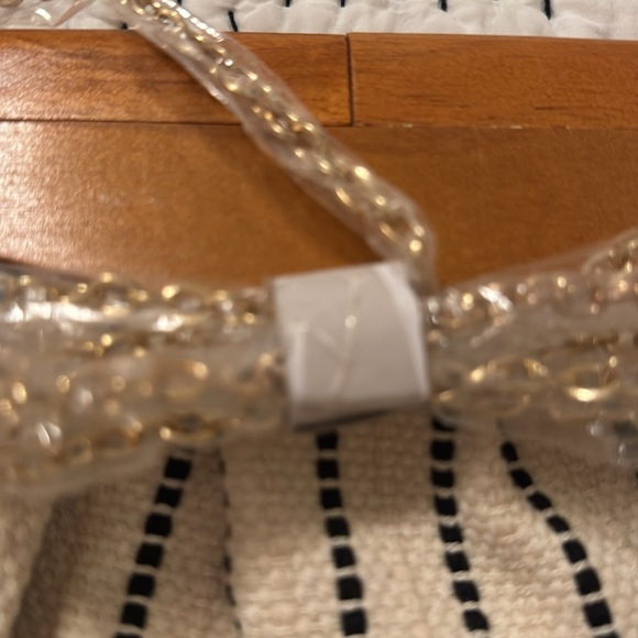 NWT Vici Black and Cream clutch with gold metal strap. - Picture 2 of 5